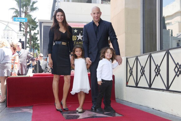 Vin Diesel avec sa compagne Paloma Jiménez, et ses deux enfants Hania et Vincent à Los Angeles, le 26 août 2013.