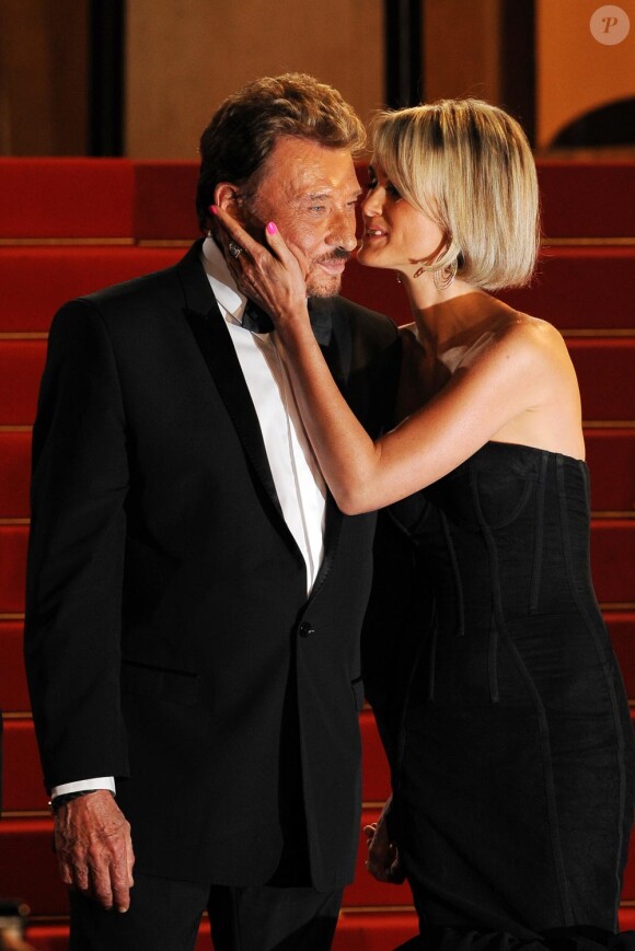Laeticia et Johnny Hallyday, heureux et amoureux au Festival de Cannes, le 17 mai 2009, pour la projection de Vengeance de Johnnie To.