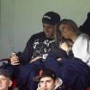 Marquinhos et sa belle fiancée Carol Cabrino, complices lors du match de Ligue 1 entre le PSG et Lorient au Parc des Princes à Paris, le 20 mars 2015
