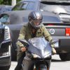 Exclusif - Prix Spécial - Justin Bieber fait de la moto à Los Angeles, le 17 mars 2015. Le chanteur a customisé sa moto Ducati avec ses initiales "JB". Escorté par ses gardes du corps, Justin a suivi la voiture de Corey Gamble (ex de Kris Jenner) vers une destination inconnue! 