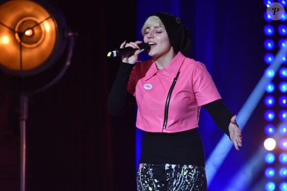 Elvya - Les 12 finalistes de 'The Voice' saison 4 chantent pour l'association "Tout Le Monde Chante Contre Le Cancer" pour les enfants malades à Disneyland Paris le 29 mars 2015