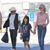 Exclusif - Johnny Hallyday, sa femme Laeticia et leur fille dans les rues de Los Angeles, le 27 mars 2015