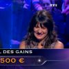 Raymond Domenech et Estelle Denis dans Qui veut gagner des millions ? sur TF1 le vendredi 17 avril 2015.