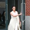 Kim Kardashian quitte son appartement à SoHo et se rend au Cipriani 42nd Street pour assister au déjeuner Power of Women du magazine Variety. New York, le 24 avril 2015.