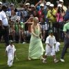 Lindsey Vonn avec Tiger Woods et ses enfants Sam et Charlie lors du Par 3 Contest en marge du Masters d'Augusta, à Augusta, le 8 avril 2015