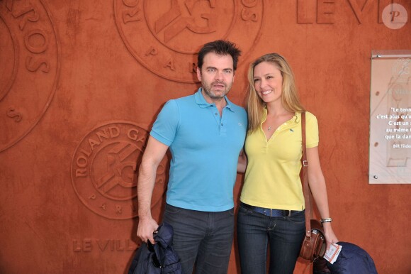 Clovis Cornillac et sa femme Lilou Fogli - People au village des Internationaux de France de tennis de Roland Garros à Paris, le 6 juin 2014.