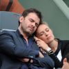 Clovis Cornillac et sa femme Lilou Fogli - People aux Internationaux de France de tennis de Roland Garros à Paris, le 3 juin 2014. 