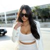 Kim Kardashian arrive à l'aéroport de Los Angeles le 9 mai 2015. Elle revient de New York où elle assurait la promotion de son livre.