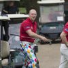 Mike Tindall, encouragé par son épouse Zara Phillips, participait à la 3e édition du tournoi de golf caritatif ISPS Handa Celebrity Golf Classic le 8 mai 2015 à The Grove, dans l'Hertfordshire.