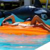 Devin Brugman se détend dans une piscine de l'hôtel Thompson Miami Beach. Miami, le 7 mai 2015.