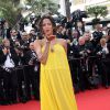 Noémie Lenoir (robe Chloé), enceinte de 6 mois, lors de la Montée des marches du film "La Tête Haute" pour l'ouverture du 68e Festival du film de Cannes le 13 mai 2015.