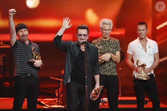 Adam Clayton, Bono, The Edge et Larry Mullen de U2 - Cérémonie des Bambi Awards 2014 à Berlin le 13 novembre 2014.