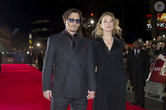 Johnny Depp et sa fiancée Amber Heard - Avant-première du film "Charlie Mortdecai" à Londres. Le 19 janvier 2015. 