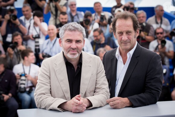 Stéphane Brizé, Vincent Lindon - Photocall du film "La Loi du marché" lors du 68e Festival international du film de Cannes le 18 mai 2015