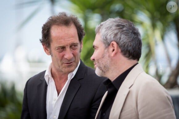 Vincent Lindon, Stéphane Brizé - Photocall du film "La Loi du marché" lors du 68e Festival international du film de Cannes le 18 mai 2015