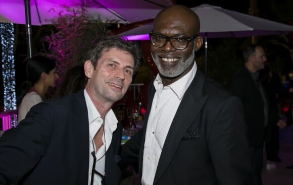 Exclusif - Frédéric Taddeï et Ériq Ebouaney en soirée à la suite Sandra and Co au 63 la croisette à Cannes le 17 mai 2015.