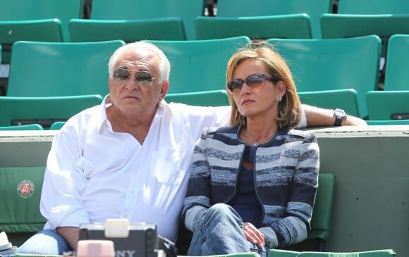 Dominique Strauss Kahn et sa compagne Myriam L'Aouffir assistent aux Internationaux de France de tennis de Roland Garros le 30 mai 2015.