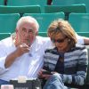 Dominique Strauss Kahn et sa chérie Myriam L'Aouffir assistent aux Internationaux de France de tennis de Roland Garros le 30 mai 2015.