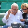 Dominique Strauss Kahn et Myriam L'Aouffir assistent aux Internationaux de France de tennis de Roland Garros le 30 mai 2015.
