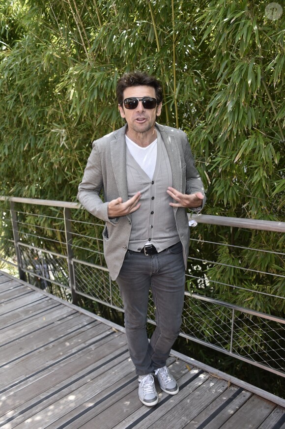 Patrick Bruel pose au Village lors de l'edition 2015 du tournoi de tennis de Roland Garros a Paris, France, le 30 mai 2015