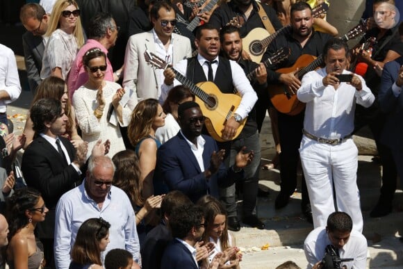 Exclusif - Omar Sy et sa femme Hélène, Chico Bouchikhi (Chico and the Gypsies) - Mariage religieux de Vincent Labrune, Président de l'Olympique de Marseille, et Laetitia de Luca à l'église collégiale Saint-Martin de Saint-Rémy-de-Provence, le 6 juin 2015.
