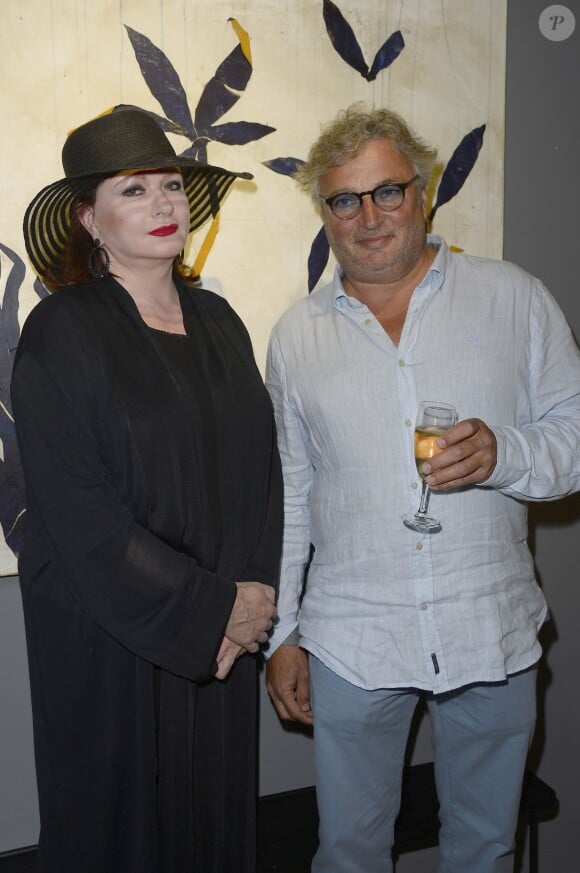 Exclusif - Catherine Jacob et Pierre-Marie Brisson, lors du vernissage de l'exposition de Pierre-Marie Brisson à la galerie Shchukin à Paris le 4 juin 2015.
