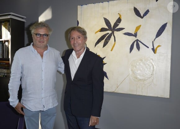 Exclusif - Pierre-Marie Brisson et Francis Veber, lors du vernissage de l'exposition de Pierre-Marie Brisson à la galerie Shchukin à Paris le 4 juin 2015.