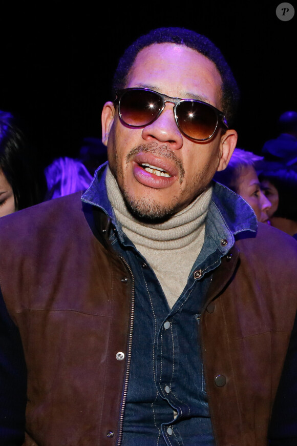 JoeyStarr (Joey Starr) à la Tour Eiffel, à Paris le 7 mars 2015.