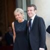 Le ministre Emmanuel Macron et sa femme - Dîner d'Etat en l'honneur du Felipe VI et la reine Letizia d'Espagne, reçus par François Hollande, président de la République française, au Palais de l'Elysée à Paris le 2 juin 2015.