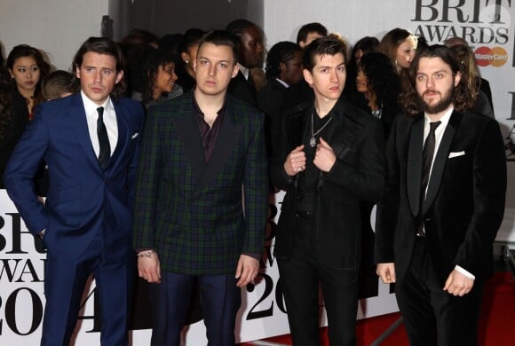 Le groupe Arctic Monkeys (Matt Helders, Nick O'Malley, Alex Turner et Jamie Cook) - Personnalités arrivant à la soirée des "Brit Awards 2014" en partenariat avec MasterCard à Londres, le 19 février 2014. 