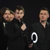 Alex Turner, Nick O'Malley, Jaime Cook et Matt Helders du groupe Arctic Monkeys ( prix du groupe britannique et prix de l'album britannique de l'année : "AM", Arctic Monkeys) - Soirée des "Brit Awards 2014" en partenariat avec MasterCard à Londres, le 19 février 2014.  