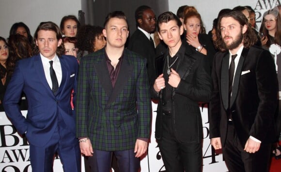 Le groupe Arctic Monkeys (Matt Helders, Nick O'Malley, Alex Turner et Jamie Cook) - Arrivée des people à la soirée des "Brit Awards 2014" en partenariat avec MasterCard à Londres, le 19 février 2014.  Arrivals at the BRIT Awards with MasterCard 2014 19 February 2014.19/02/2014 - Londres