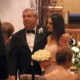 Mila Kunis et son père, Mark Kunis  au mariage de son frere aîné, Michael, avec la danseuse Alexandra Blacker à St Petersbourg en Floride, le 7 décembre 2013. 