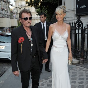 Johnny Hallyday et sa femme Laeticia Hallyday à la soirée "Vogue Paris Foundation Gala" au palais Galliera à Paris, le 6 juillet 2015.