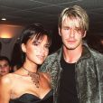  Victoria et David Beckham au concert de Whitney Houston à Londres, le 20 septembre 1999. 
  
