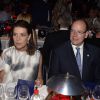 Le princesse Caroline de Hanovre et le prince Albert II de Monaco le 10 juillet 2015 dans la Salle des Etoiles au Sporting de Monte-Carlo lors du gala annuel au profit de l'association Fight Aids Monaco, présidée par la princesse Stéphanie de Monaco.