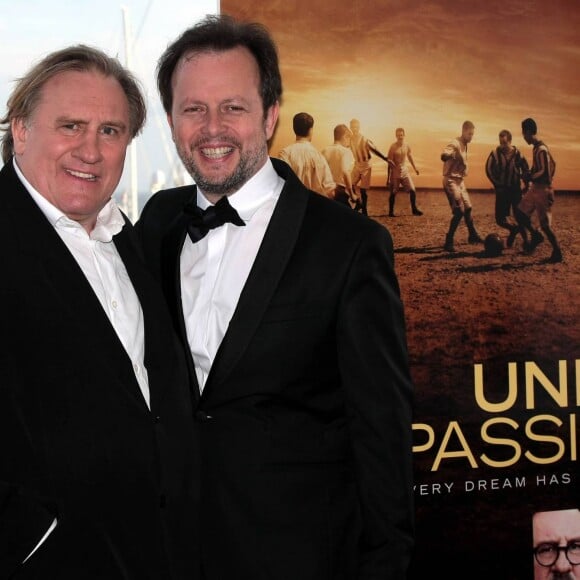 Gérard Depardieu et Frédéric Auburtin présentent le film "United Passions" lors du 67e festival de Cannes le 18 mai 2014.