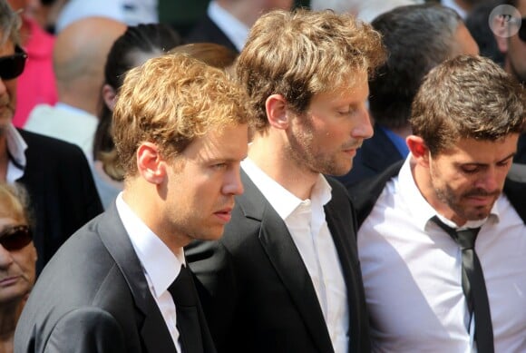 Romain Grosjean et Sebastian Vettel lors des obsèques de Jules Bianchi en la cathédrale Sainte-Réparate à Nice, le 21 juillet 2015