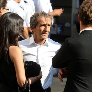 Alain Prost avec Romain Grosjean et Marion Jollès lors des obsèques de Jules Bianchi en la cathédrale Sainte-Réparate à Nice, le 21 juillet 2015