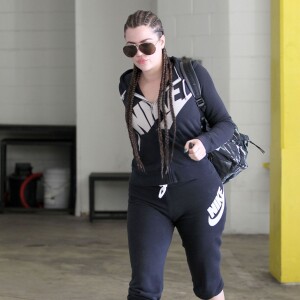 Khloe Kardashian, les cheveux tressés, va à sa séance de gym à Beverly Hills, le 14 septembre 2014. Des rumeurs circulent concernant une possible réconciliation avec Lamar Odom après un message sur son compte instagram avec une photo de la Lune: "Nous regardons la même lune mais nous vivons dans deux mondes différents". 