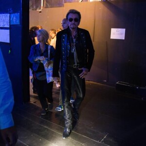 Exclusif - Johnny Hallyday entre sur la scène du concert aux Francofolies à La Rochelle le 14 juillet 2015.