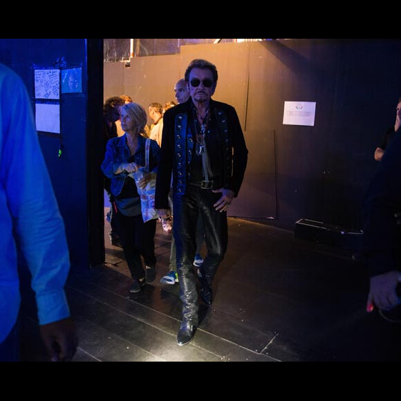 Exclusif - Johnny Hallyday entre sur la scène du concert aux Francofolies à La Rochelle le 14 juillet 2015.