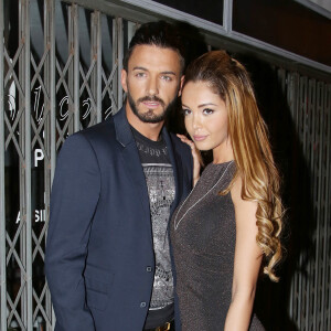 Nabilla Benattia et son petit ami Thomas Vergara - People à la sortie de la boite de nuit "Cosy Box" à Cannes, le 17 mai 2014.