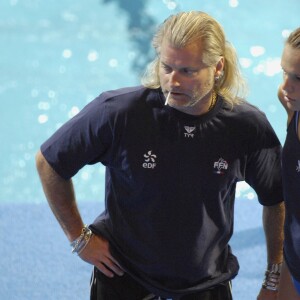 Laure Manaudou et Philippe Lucas lors des championnats du monde à la Rod Laver Arena de Melbourne, le 22 mars 2007