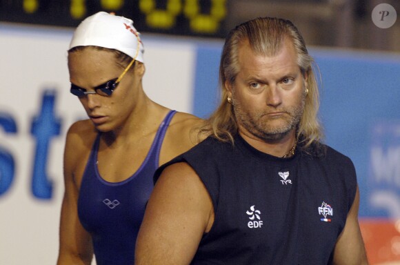 Laure Manaudou et Philippe Lucas lors des championnats du monde à la Rod Laver Arena de Melbourne, le 25 mars 2007