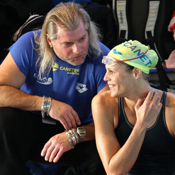 Laure Manaudou et Philippe Lucas lors des championnats du monde petit bassin à Nimes, le 8 dcembre 2007
