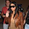 Kim Kardashian enceinte prend un vol à l'aéroport de Los Angeles, le 3 août 2015.