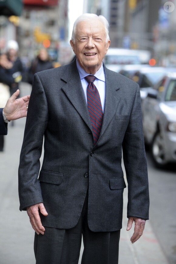 L'ancien président Jimmy Carter, arrive dans les studios de l'émission "Late Show With David Letterman" à New York. Le 24 mars 2014