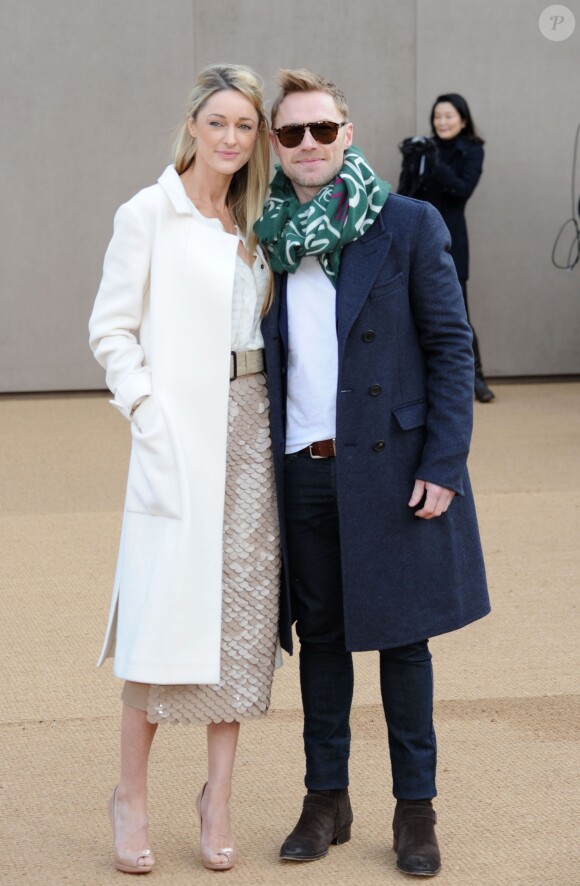 Ronan Keating et sa compagne Storm Uechtriz - Arrivées au défilé "Burberry Prorsum" lors de la fashion week à Londres, le 23 février 2015. 