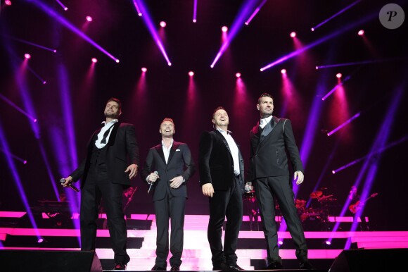 Keith Duffy, Ronan Keating, Mikey Graham, Shane Lynch - Le groupe Boyzone en concert au Wembley Arena a Londres, le 21 decembre 2013. 